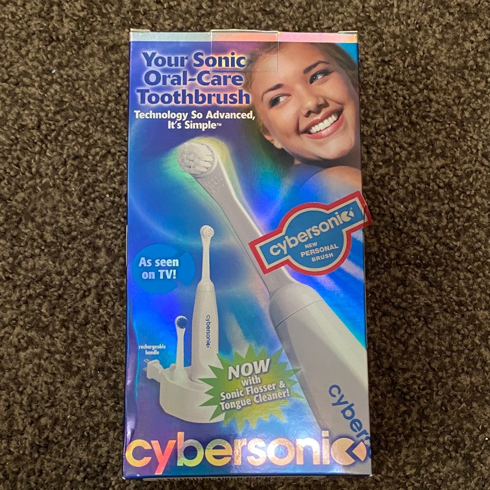 Brand new Cybersonic Oral care toothbrush with sonic flosser& tongue cleaner